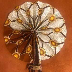 Brown and White Patterned Hand Fan
